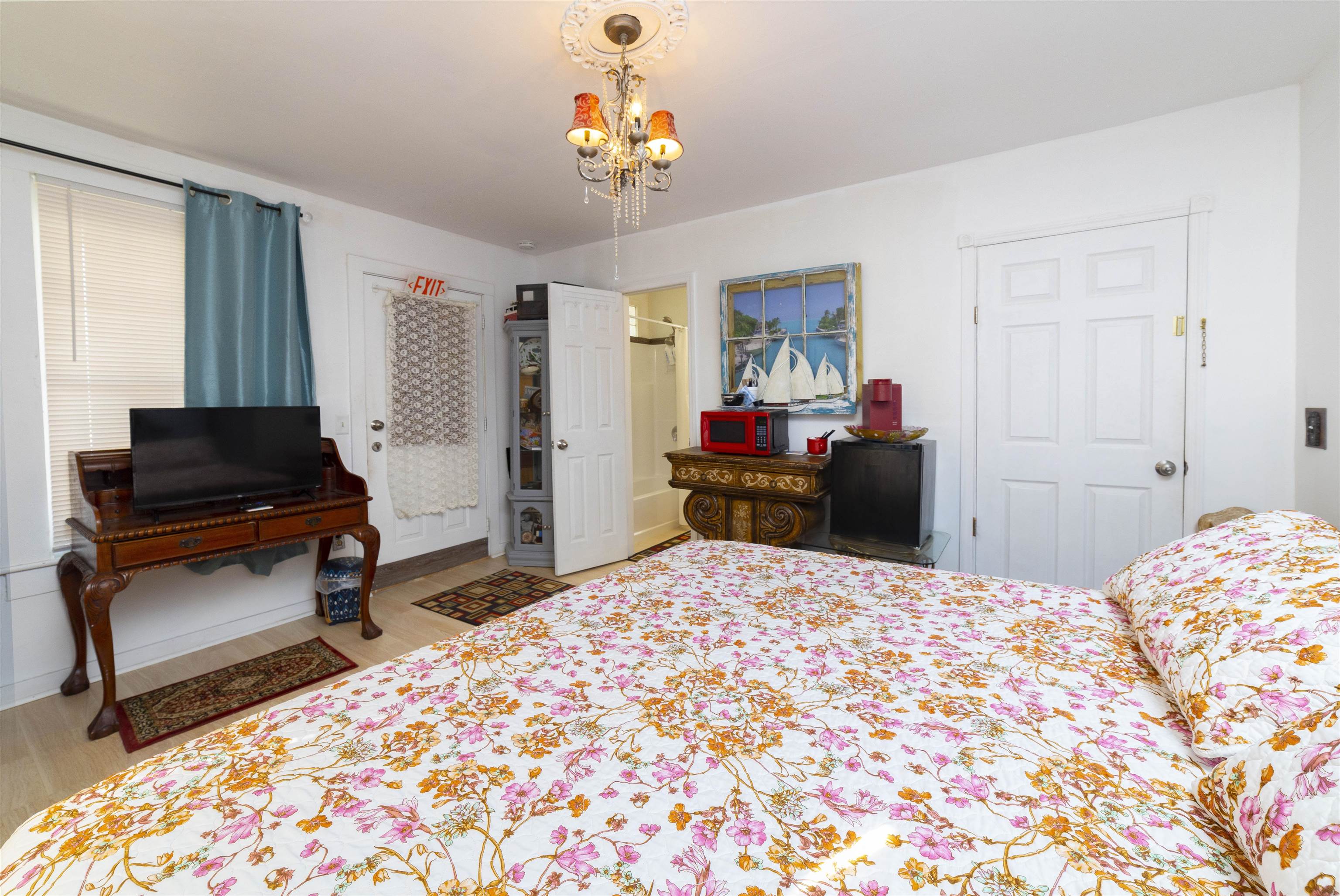 77 Oneida Street St. Augustine, FL 32084 - Photo 14 of 26 a bedroom that has a bed and a dresser in it