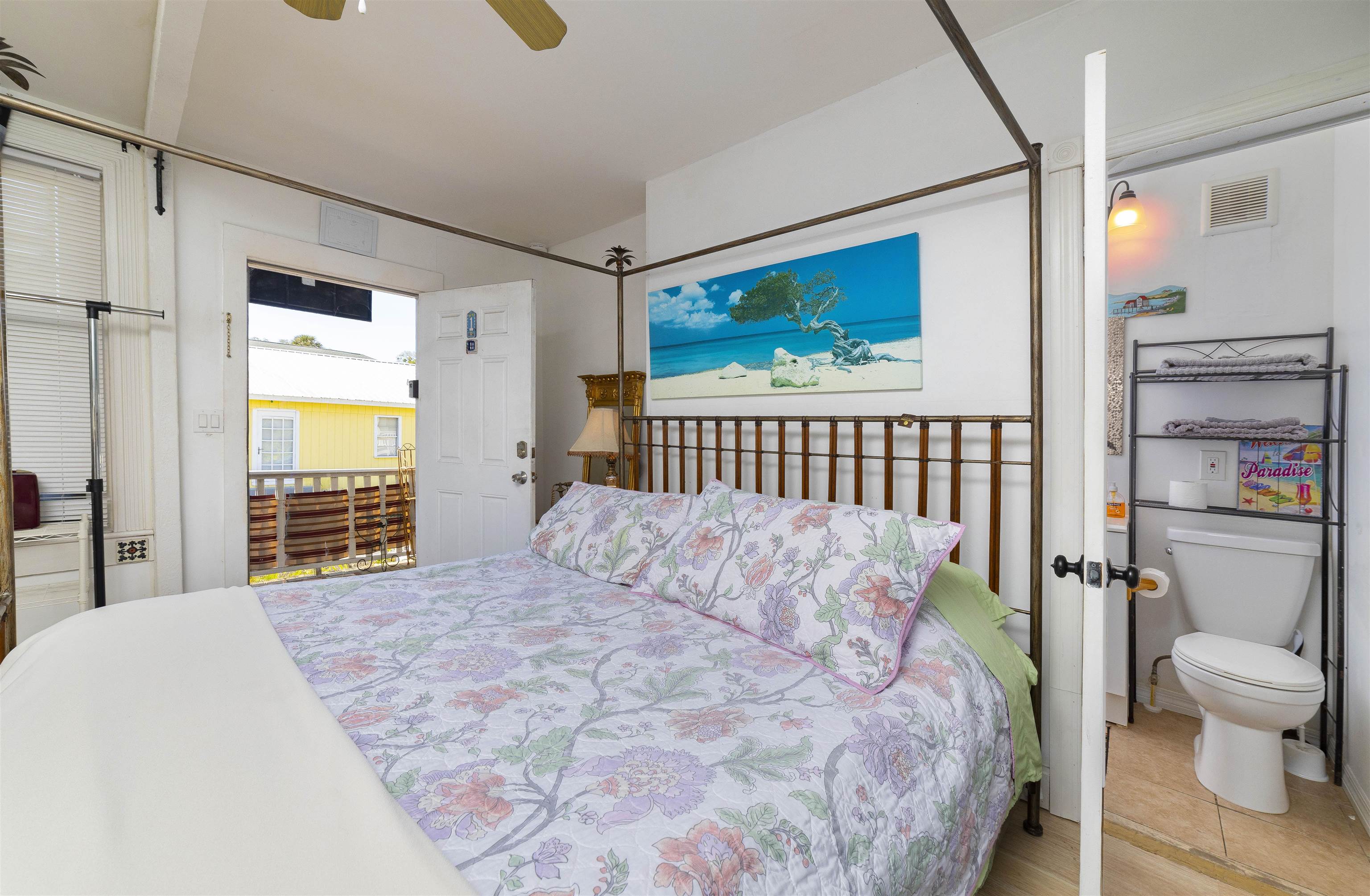 77 Oneida Street St. Augustine, FL 32084 - Photo 8 of 26 a bedroom with a bed and a window