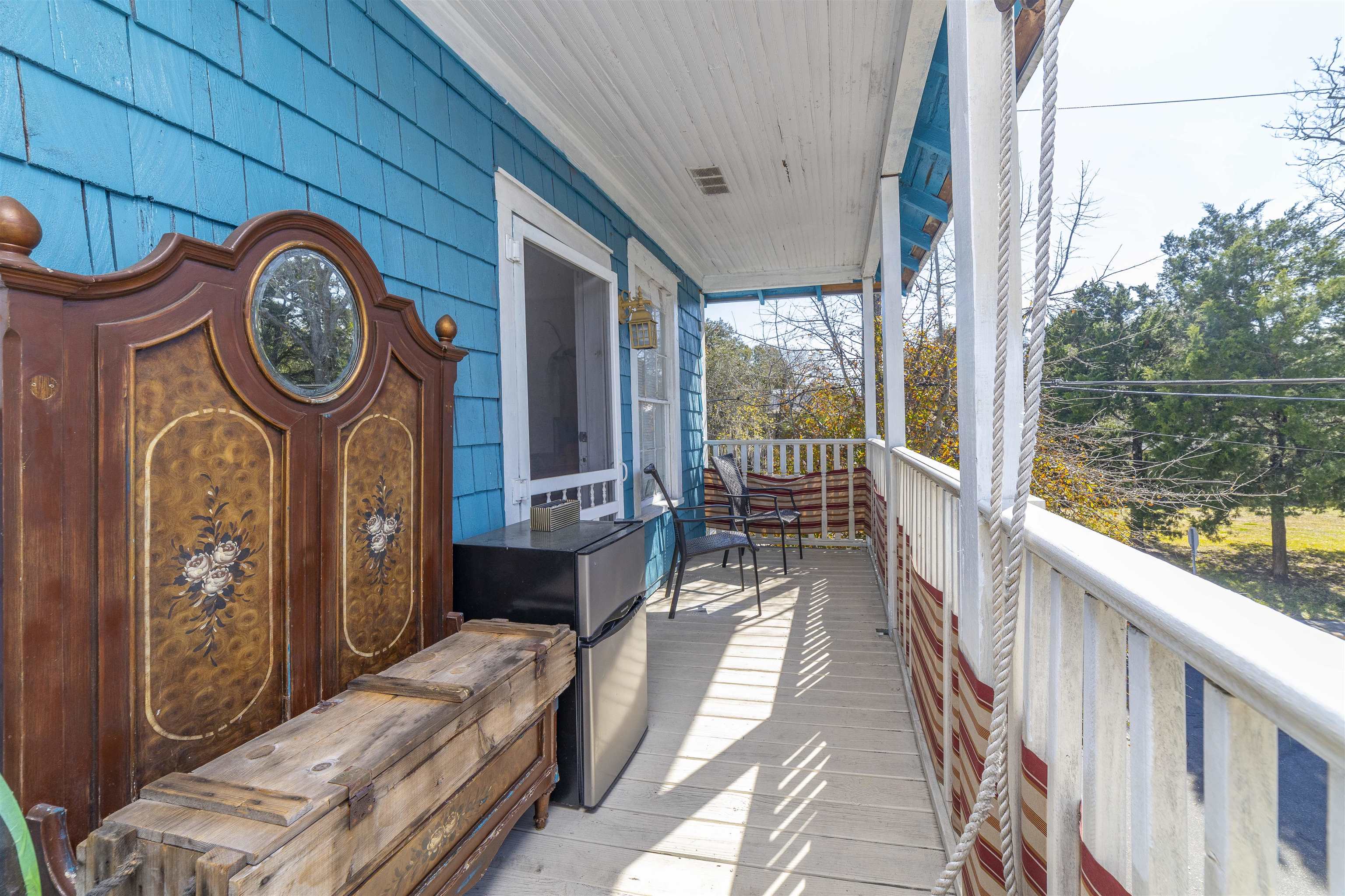 77 Oneida Street St. Augustine, FL 32084 - Photo 9 of 26 a bedroom with furniture and a large window