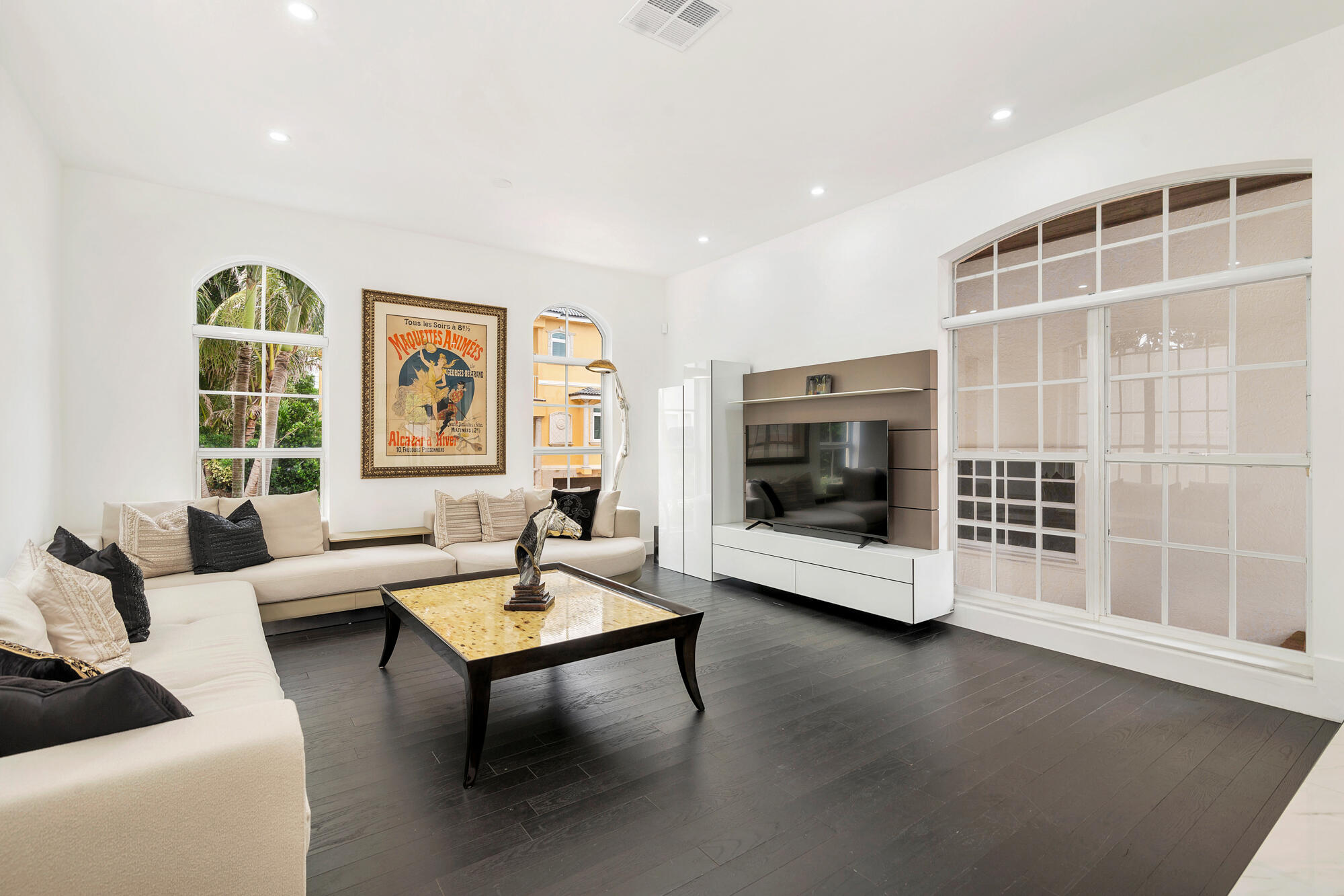 460 Surfside Lane Juno Beach, FL 33408 - Photo 12 of 51 a living room with furniture and a flat screen tv