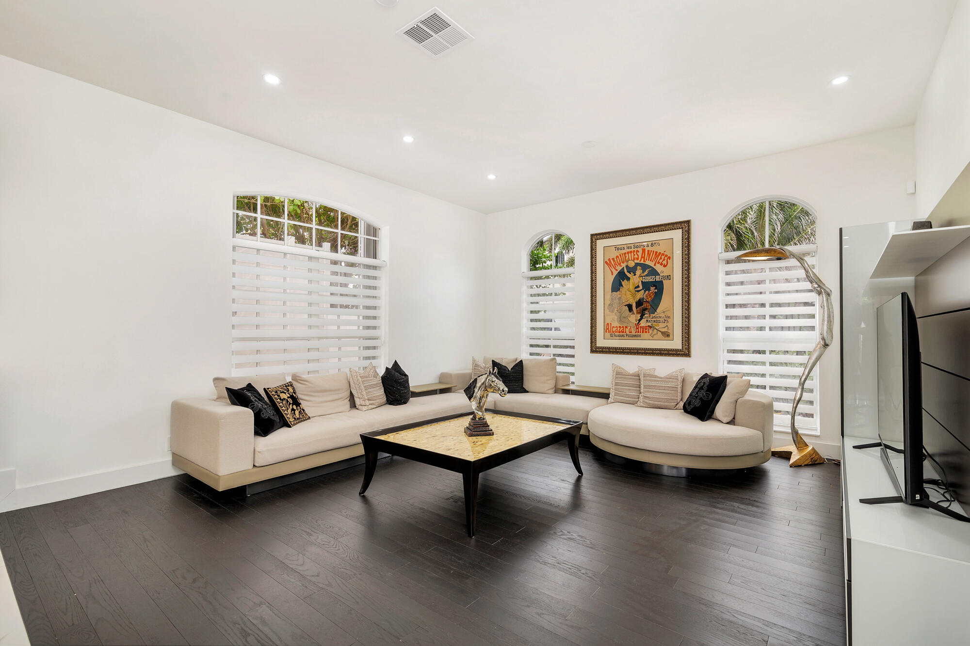 460 Surfside Lane Juno Beach, FL 33408 - Photo 13 of 51 a living room with furniture and a flat screen tv