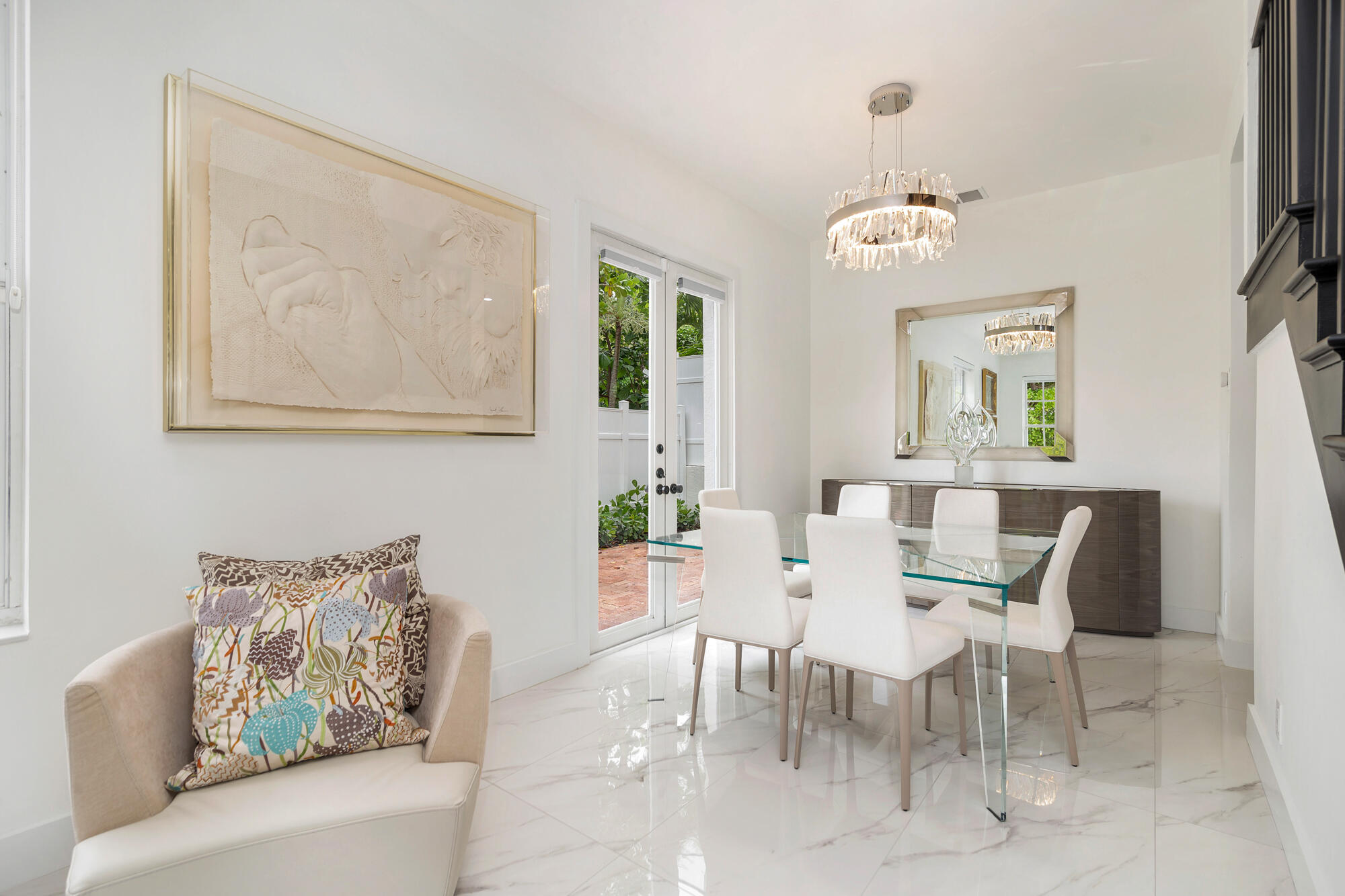 460 Surfside Lane Juno Beach, FL 33408 - Photo 17 of 51 a view of a dining room with furniture and a chandelier