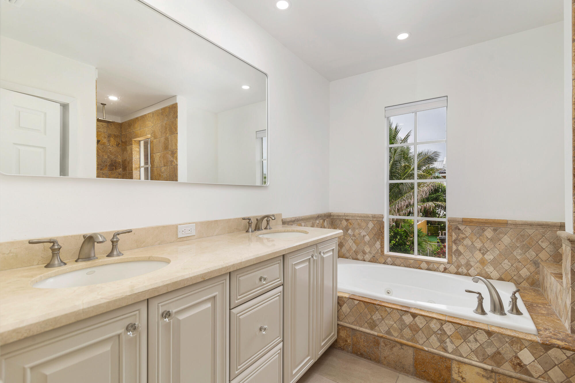 460 Surfside Lane Juno Beach, FL 33408 - Photo 22 of 51 a bathroom with a granite countertop sink mirror bathtub and toilet