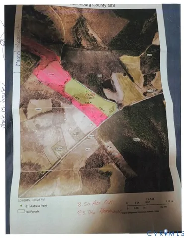 a front view of a house with garden and trees