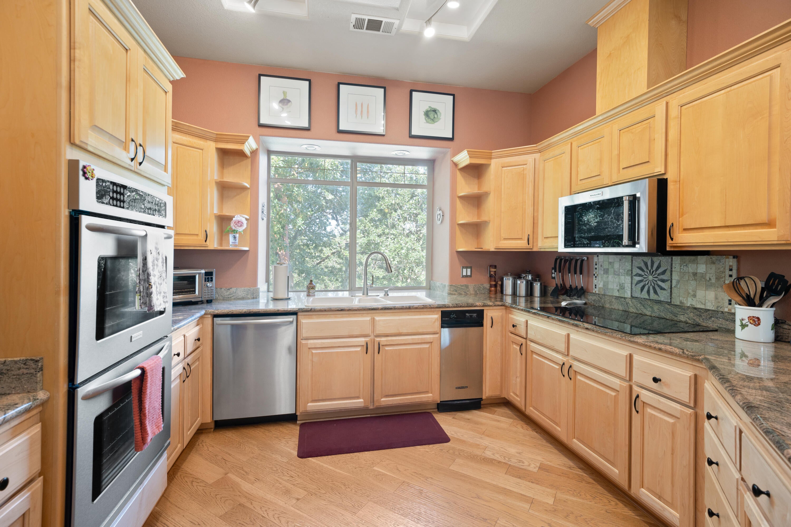5668 Upper River Road Grants Pass, OR 97526 - Photo 17 of 50 stepsaver kitchen with all the stainless appliances and picture window at the sink
