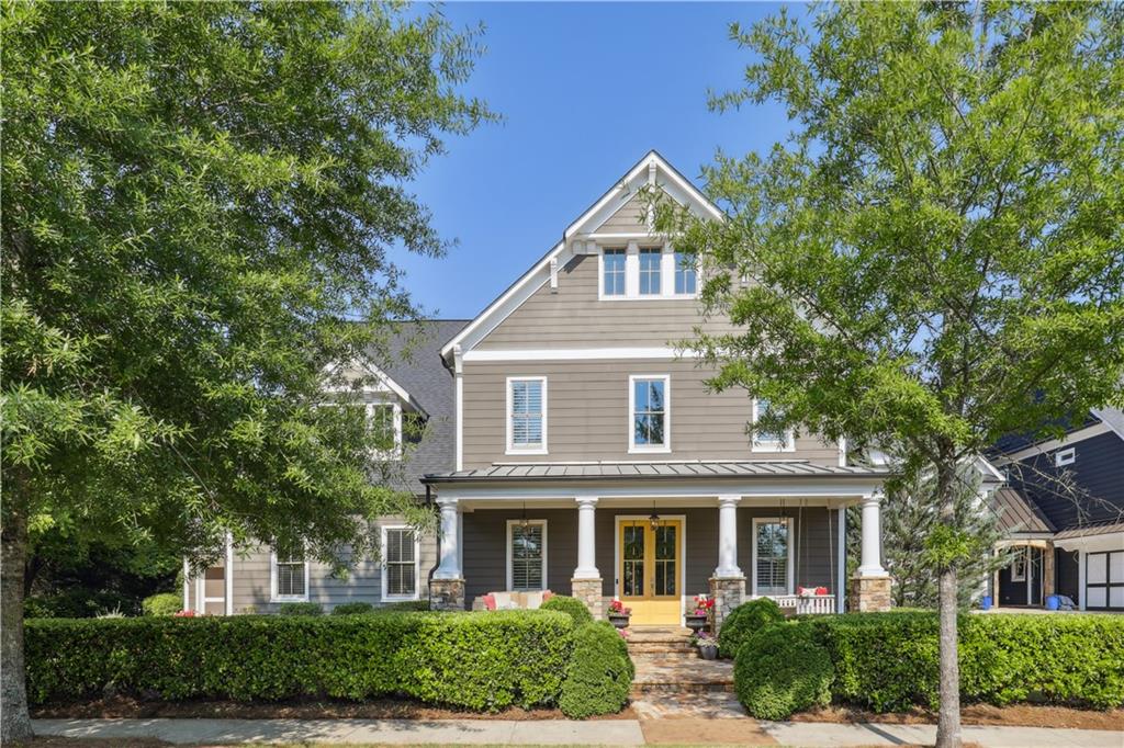 1280 Lee Street Milton, GA 30004 - Photo 1 of 1 a front view of a house with a yard