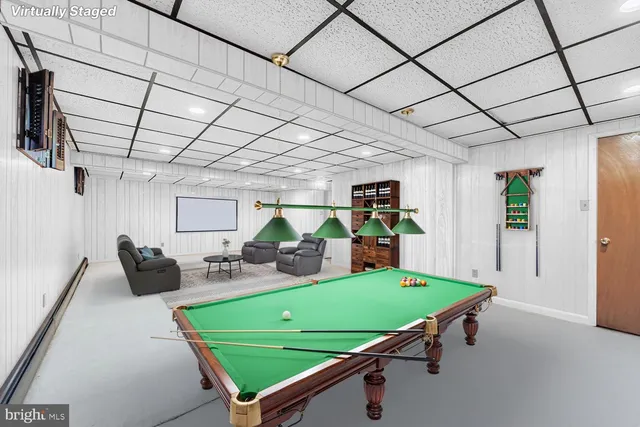 a room with furniture and a large window