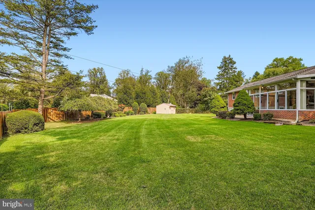 a view of a house with a big yard
