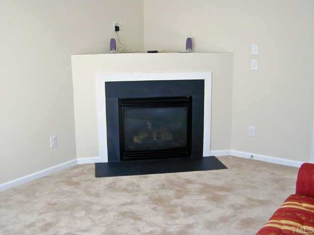 404 Hanson Road Durham, NC 27713 - Photo 3 of 10 This home has a practical layout. Family room is private and has a beautiful fireplace with area above for your TV or sound equippment.It also offers a view of the backyard and plenty of light. Other