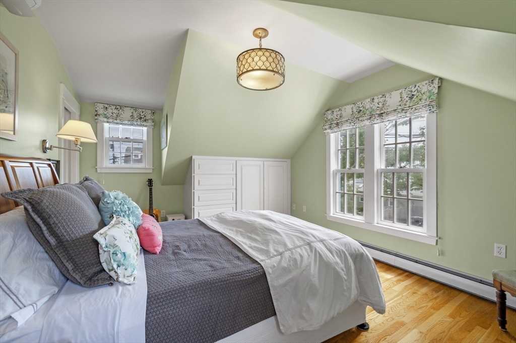 5 Gregory Street Marblehead, MA 01945 - Photo 15 of 29 a bedroom with a bed and a window