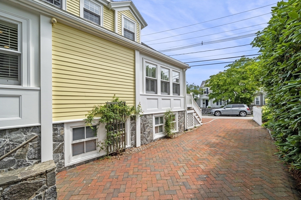 5 Gregory Street Marblehead, MA 01945 - Photo 25 of 29 a front view of a house with a yard