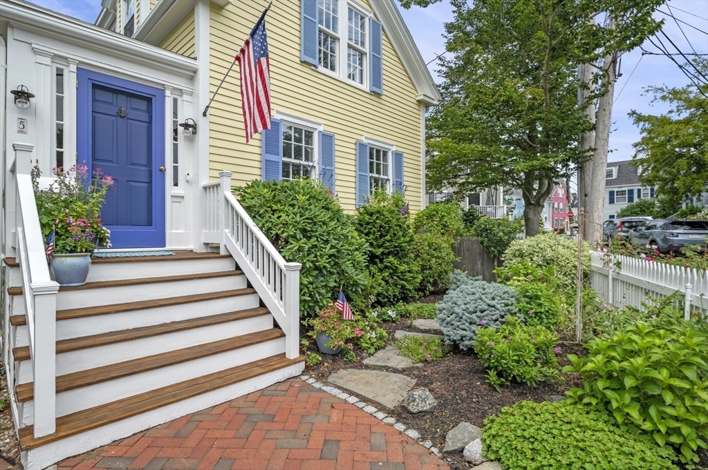 5 Gregory Street Marblehead, MA 01945 - Photo 26 of 29 a view of a house with potted plants