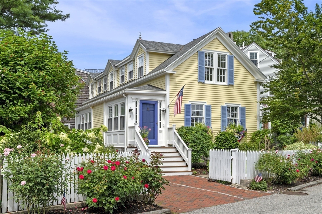 5 Gregory Street Marblehead, MA 01945 - Photo 27 of 29 a front view of a house with a yard