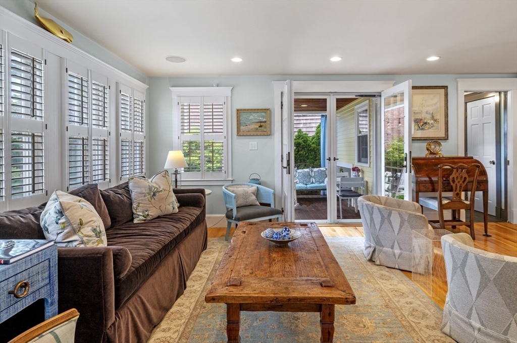 5 Gregory Street Marblehead, MA 01945 - Photo 6 of 29 a living room with furniture and a large window
