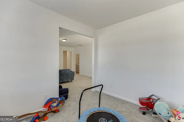 a room with a bed and a window