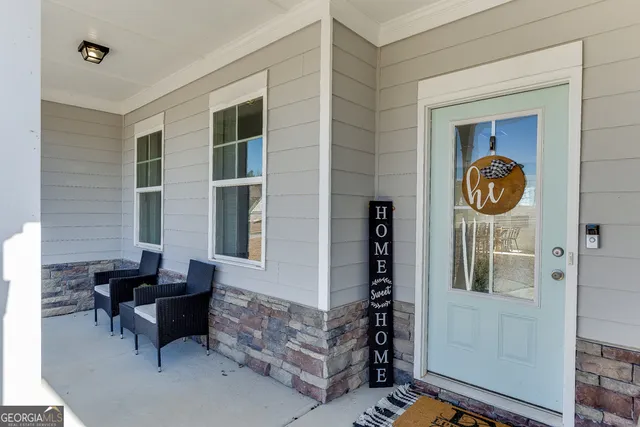 a living room with furniture and a window