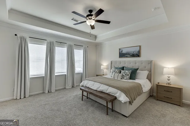 a view of a roof deck with couches and wooden floor