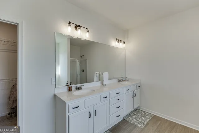 an aerial view of a house with swimming pool