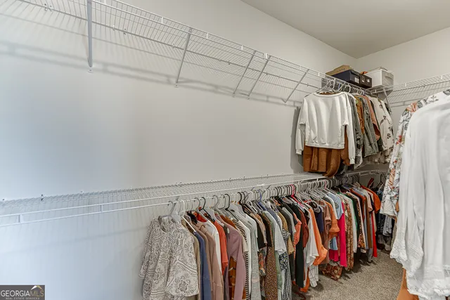 a view of a lake with couches and ocean view
