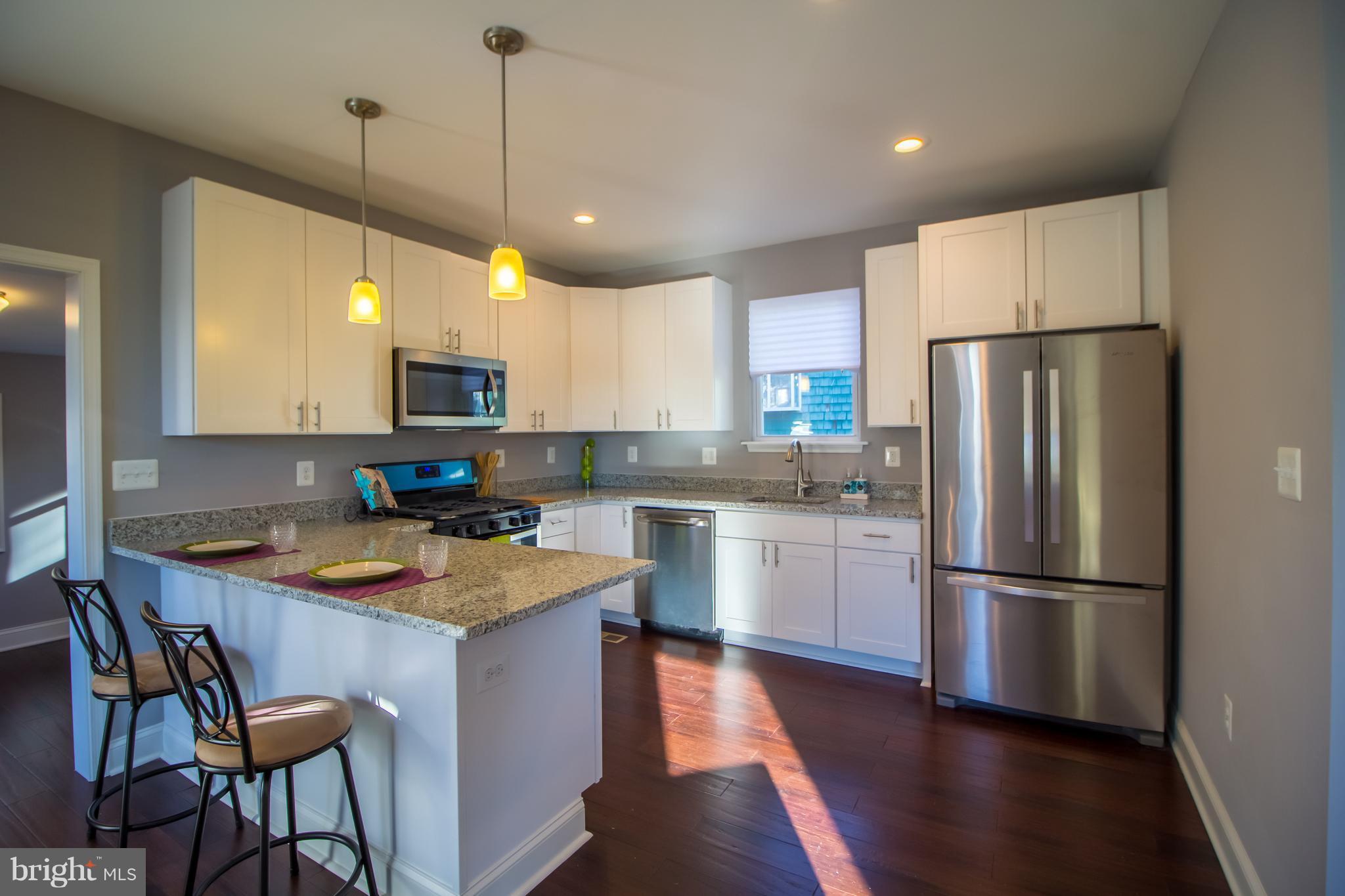 6500 Maplewood Road Baltimore, MD 21212 - Photo 9 of 30 SS Appliances and Breakfast Bar, Perfect