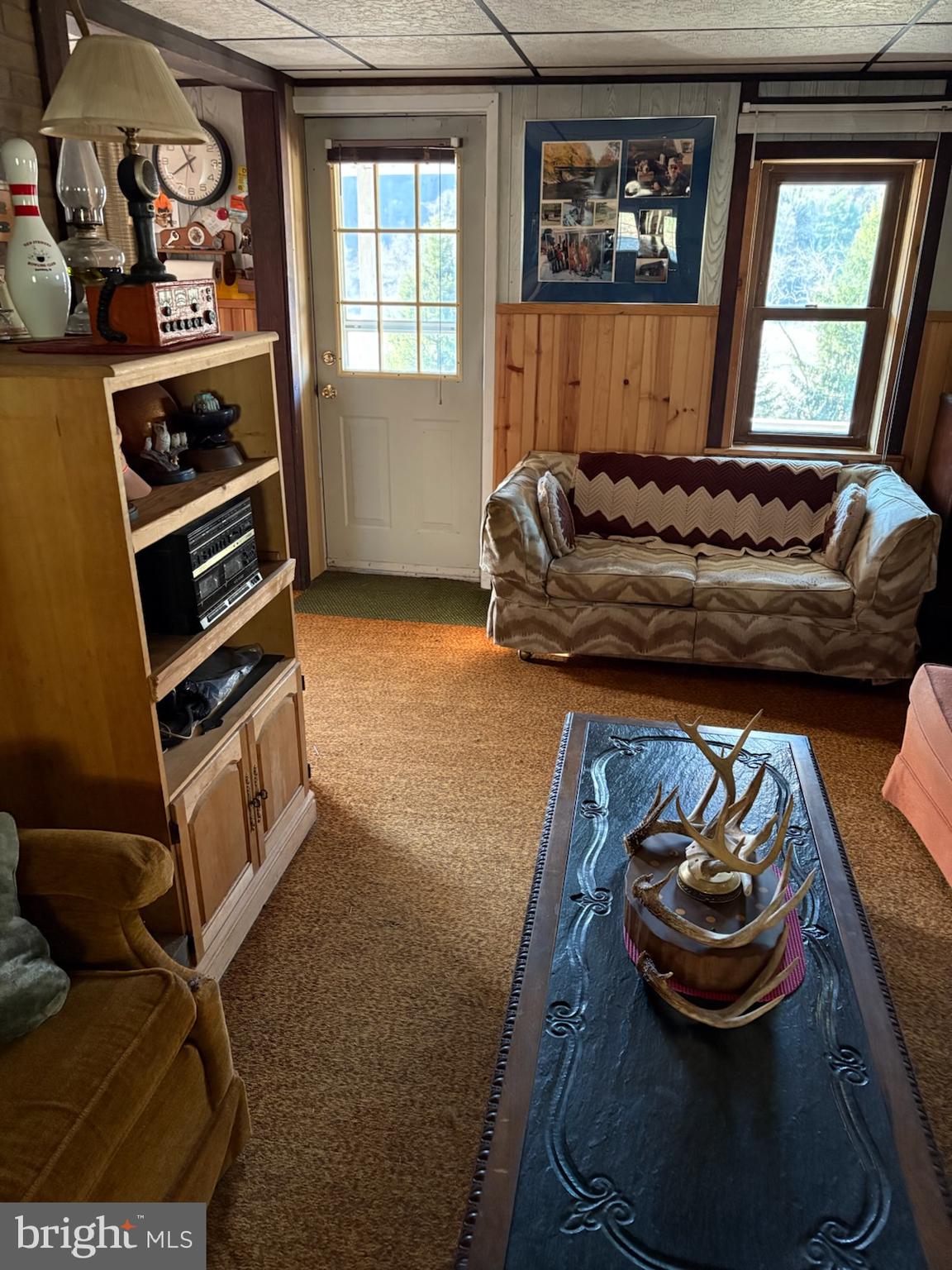 1315 1st Fork Road Austin, PA 16720 - Photo 14 of 25 a living room with furniture and a window