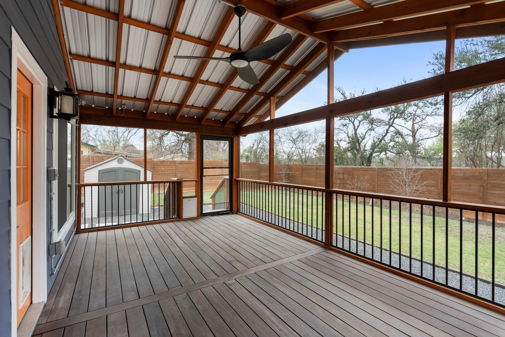 3404 Touchstone Street Austin, TX 78723 - Photo 3 of 33 Unfurnished sunroom featuring a ceiling fan and a wooden deck