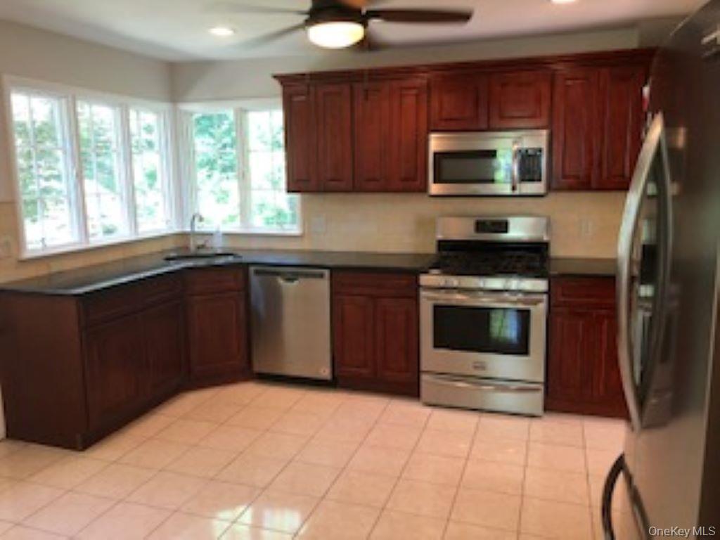 216 Mamaroneck Road Scarsdale, NY 10583 - Photo 5 of 16 Newer kitchen w/stainless appliances