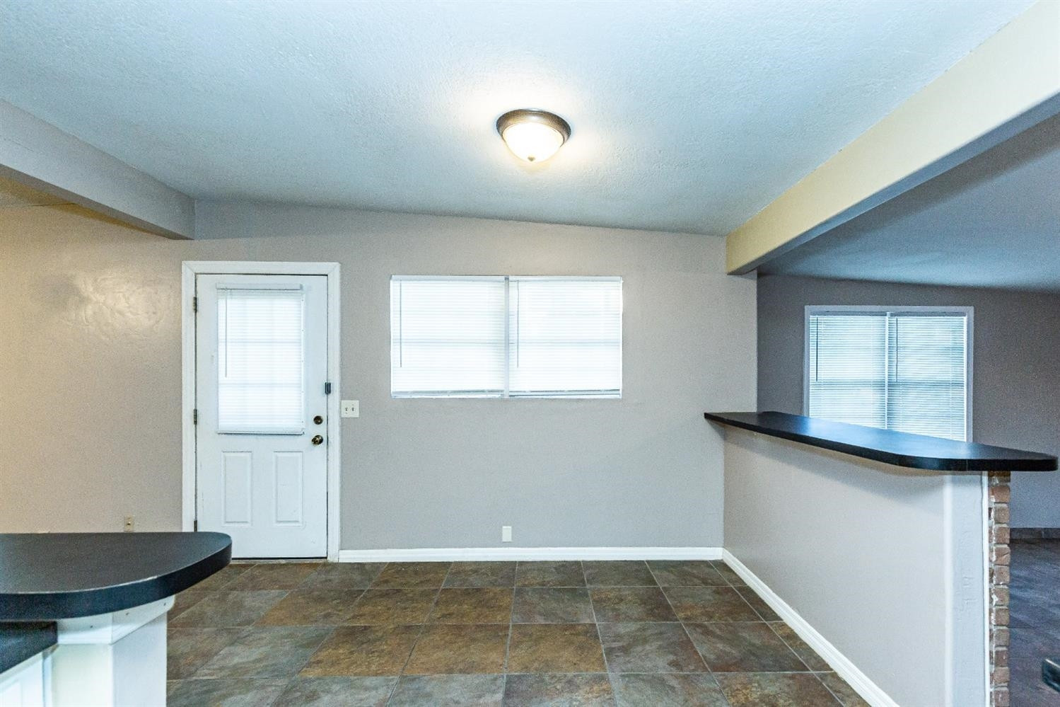 2836 65th Street Lubbock, TX 79413 - Photo 5 of 39 Entryway and Eating Area