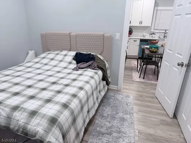 a room with furniture and wooden floor