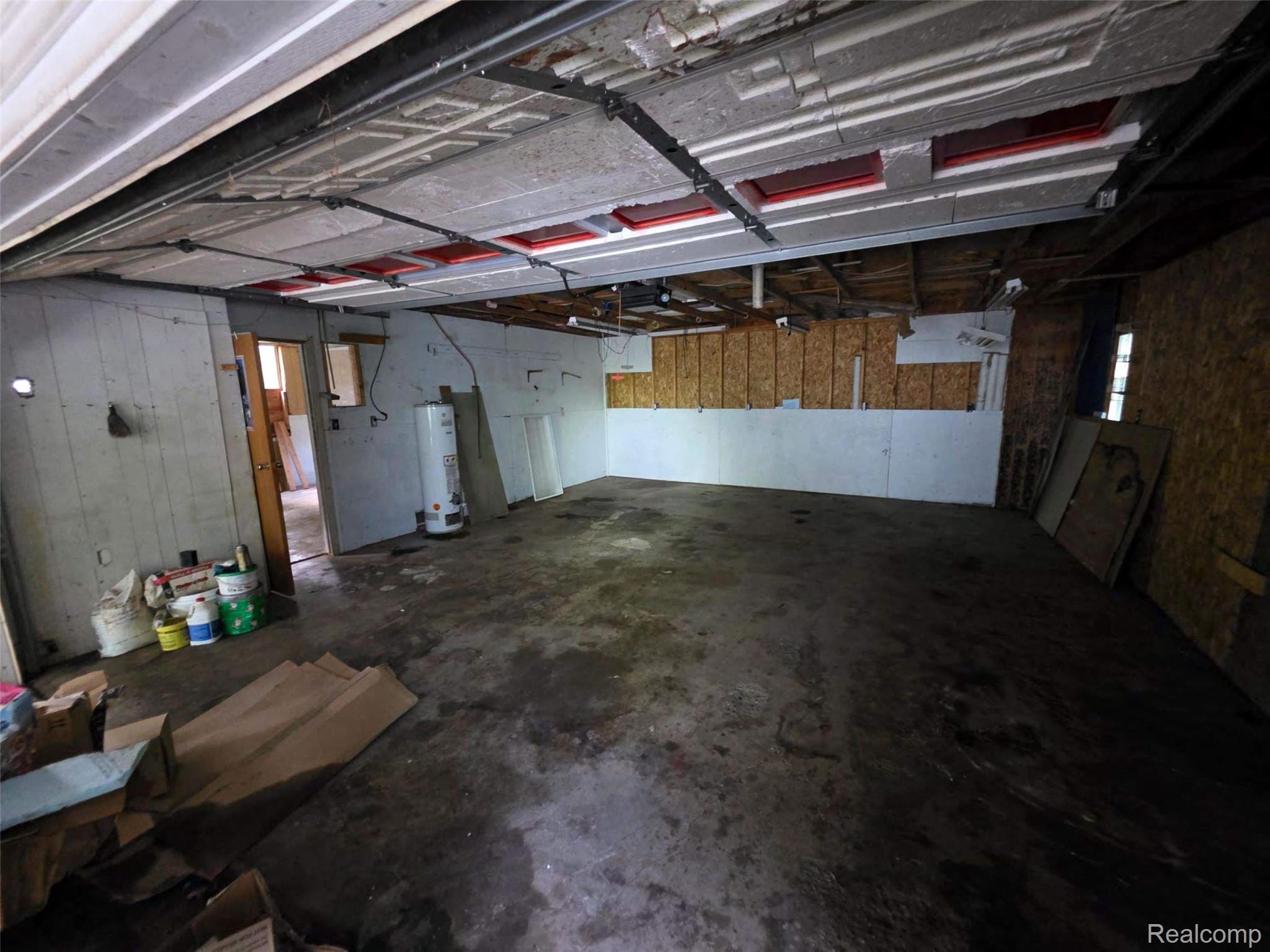 5420 Randy Drive Prescott, MI 48756 - Photo 29 of 31 Spacious garage interior with concrete flooring
