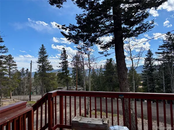 a view of a wooden roof deck