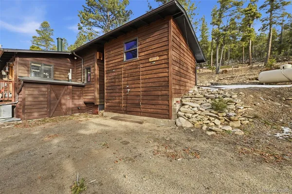 a view of a park with swings
