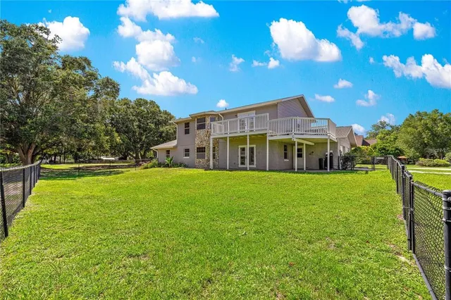 a view of entryway with workspace and stairs