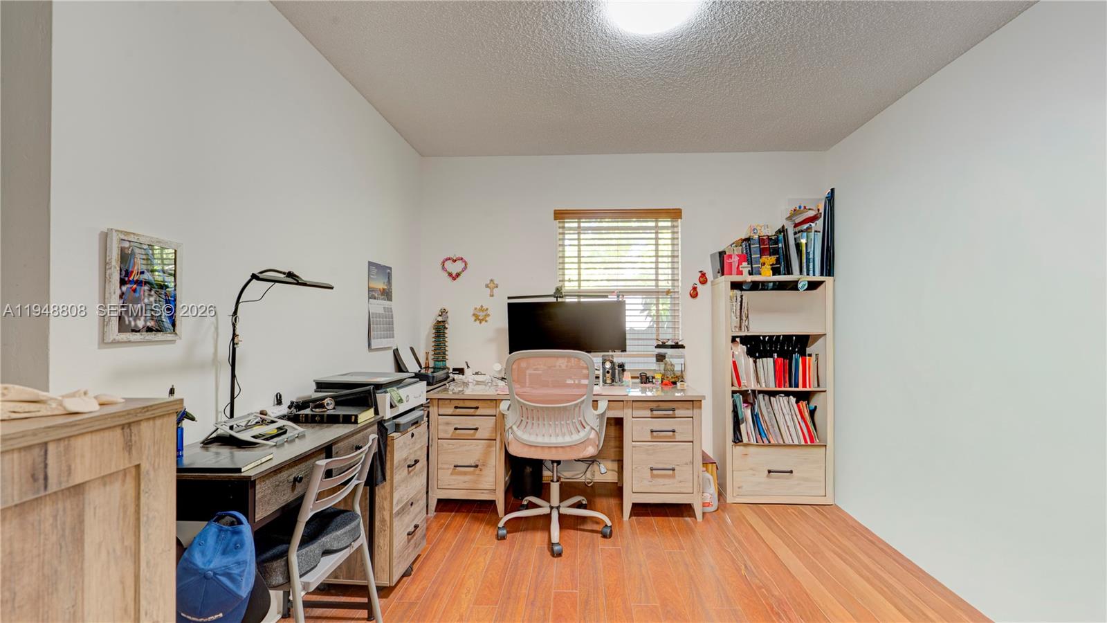 6815 Southwest 134th Court Miami, FL 33183 - Photo 14 of 53 a room with furniture and a wooden floor