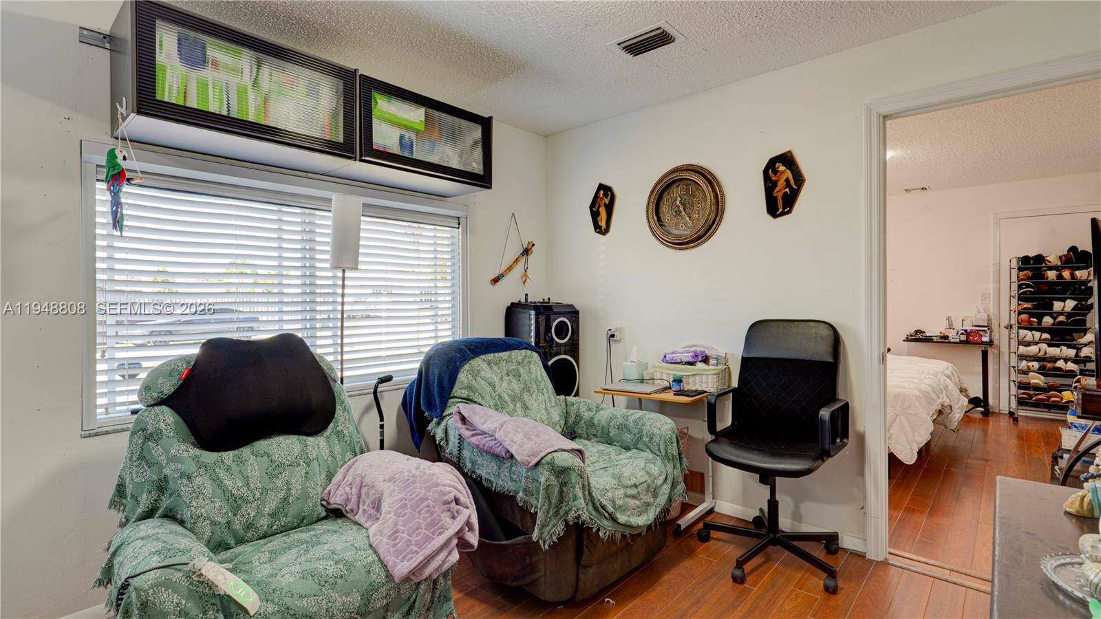 6815 Southwest 134th Court Miami, FL 33183 - Photo 25 of 53 a bedroom with furniture and a window