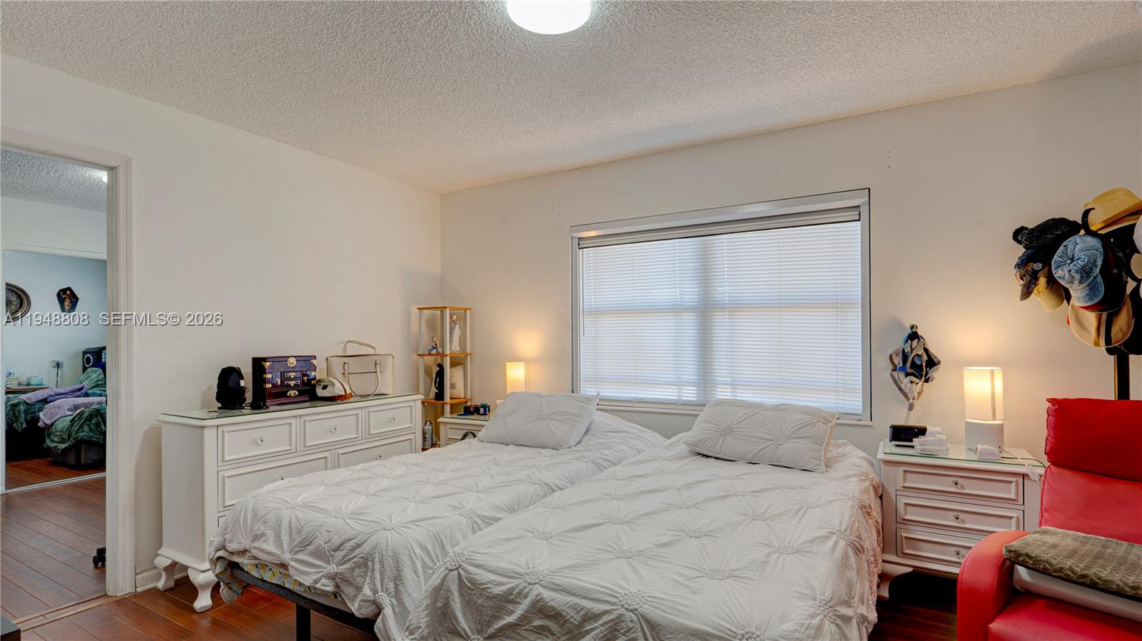 6815 Southwest 134th Court Miami, FL 33183 - Photo 29 of 53 a bedroom with a bed and a window