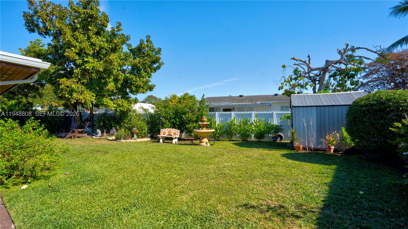 6815 Southwest 134th Court Miami, FL 33183 - Photo 35 of 53 a view of a house with a yard and sitting area