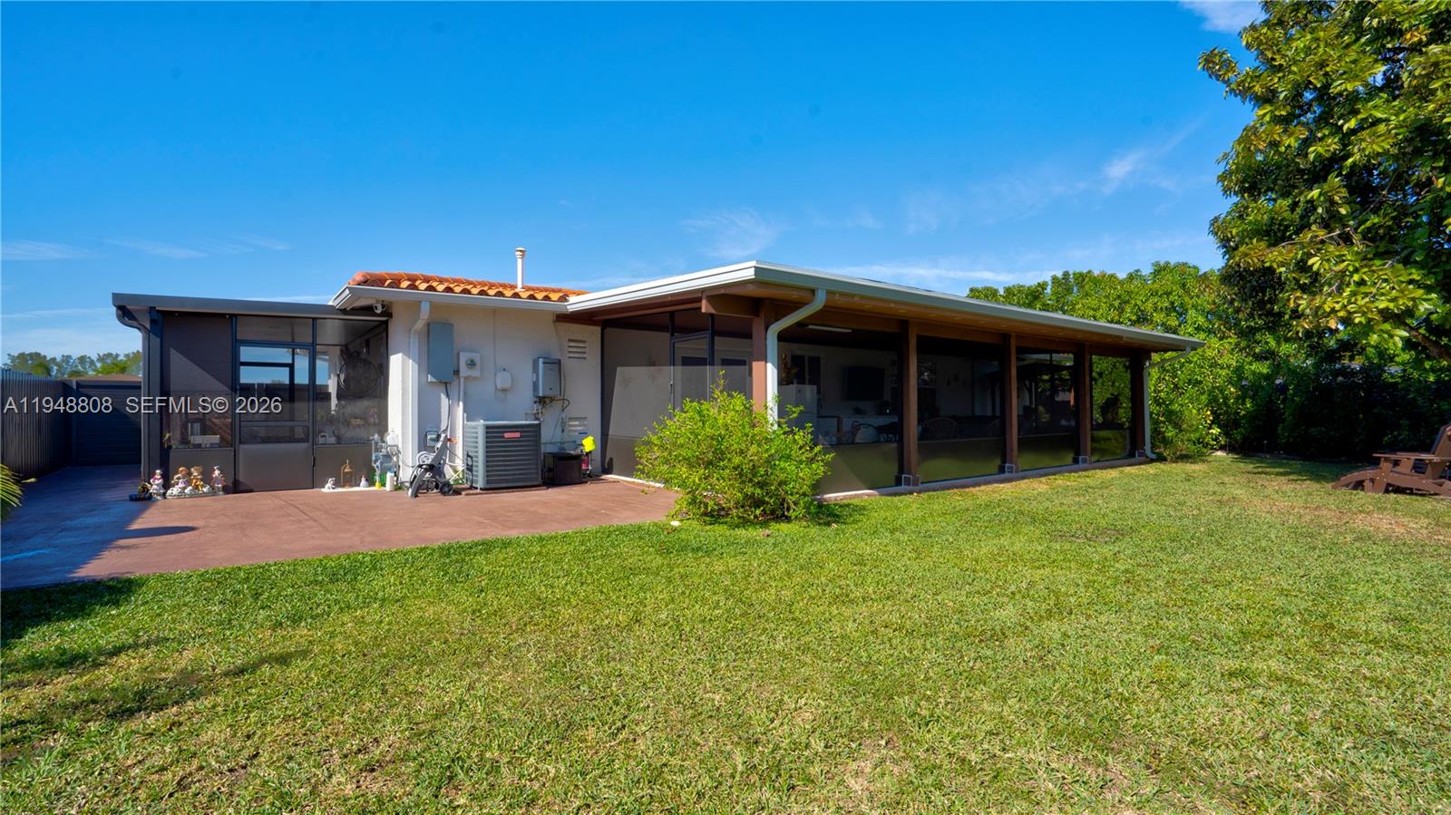 6815 Southwest 134th Court Miami, FL 33183 - Photo 37 of 53 a front view of a house with a yard and porch