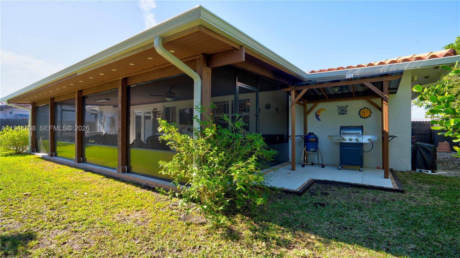 6815 Southwest 134th Court Miami, FL 33183 - Photo 42 of 53 a front view of a house with garden