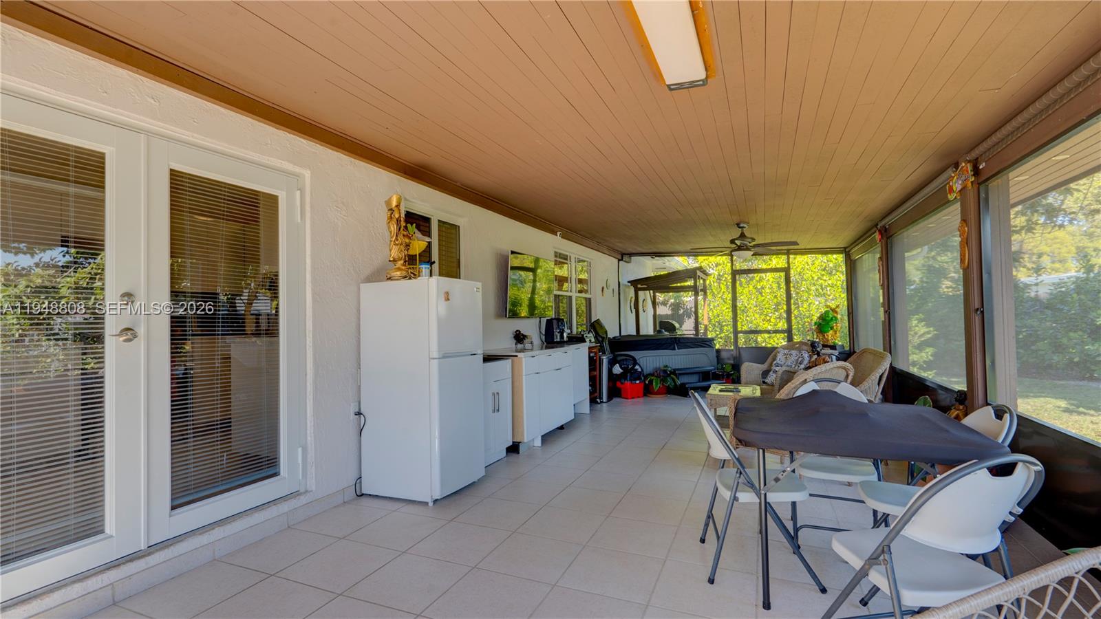 6815 Southwest 134th Court Miami, FL 33183 - Photo 46 of 53 a view of a livingroom with furniture and a window