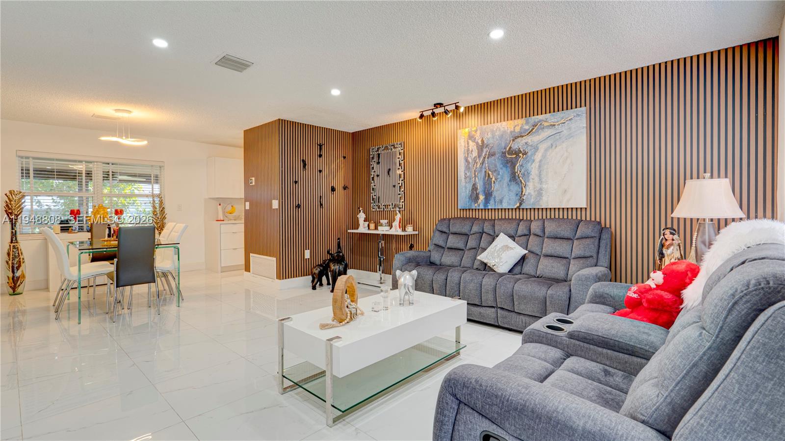 6815 Southwest 134th Court Miami, FL 33183 - Photo 6 of 53 a living room with furniture and wooden floor
