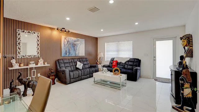 a view of a kitchen with appliances and cabinets