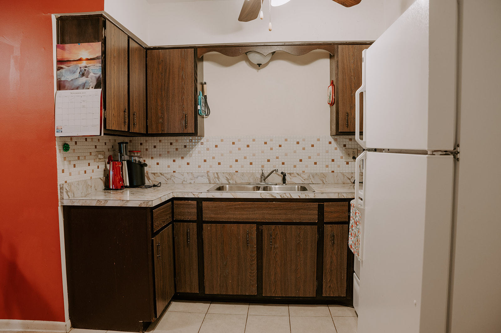 1220 South Lorraine Road, Unit 2C Wheaton, IL 60189 - Photo 5 of 14 a bathroom with a sink and a mirror