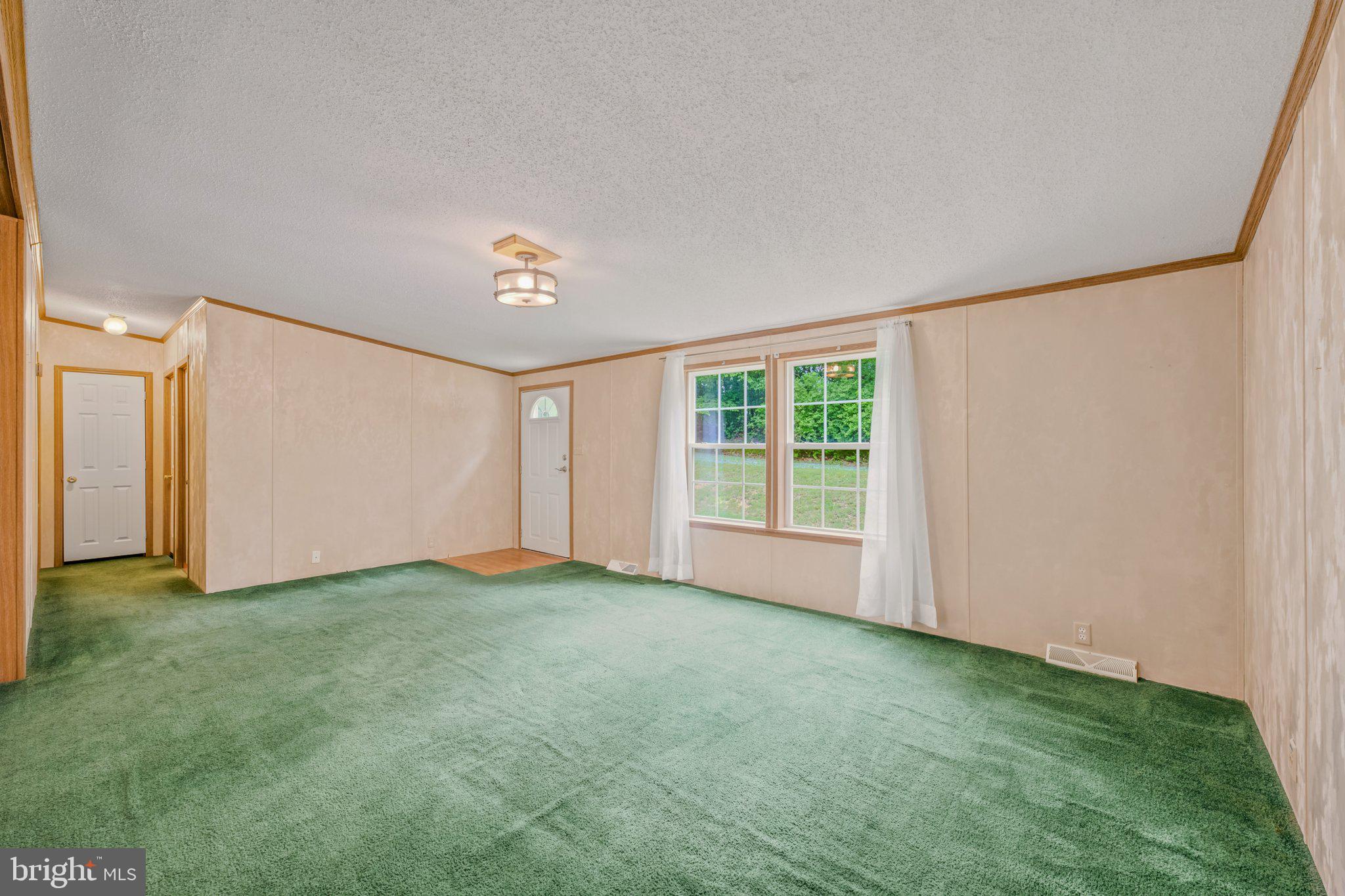 193 Co Rte 9/15 Berkeley Springs, WV 25411 - Photo 4 of 32 Living Room