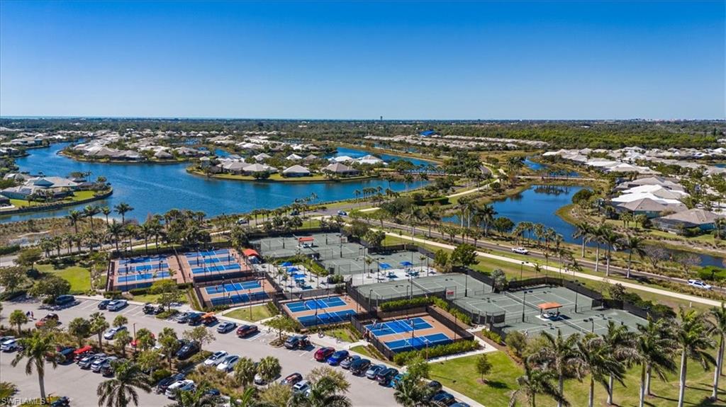 6509 Dominica Drive, Unit 101 Naples, FL 34113 - Photo 25 of 33 an aerial view of residential houses with outdoor space
