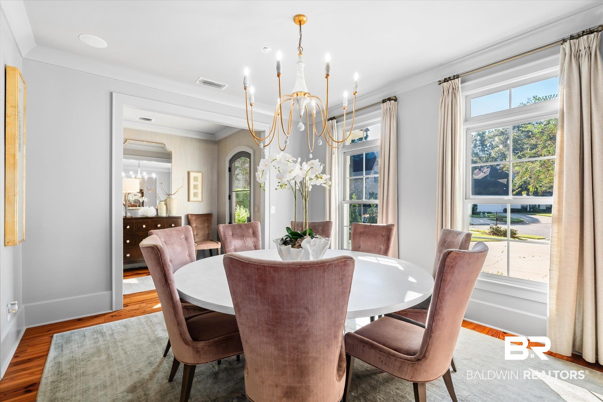320 Long Court Mobile, AL 36608 - Photo 6 of 61 Dining space with a chandelier, hardwood / wood-style floors, and crown molding