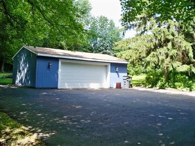5779 Streeter Road Mantua, OH 44255 - Photo 20 of 23 2+ detached garage on a paved driveway with turn around extra parking area