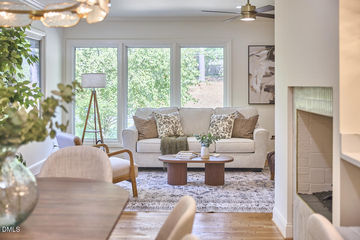 1609 Acadia Street Durham, NC 27701 - Photo 13 of 56 a living room with furniture and a large window