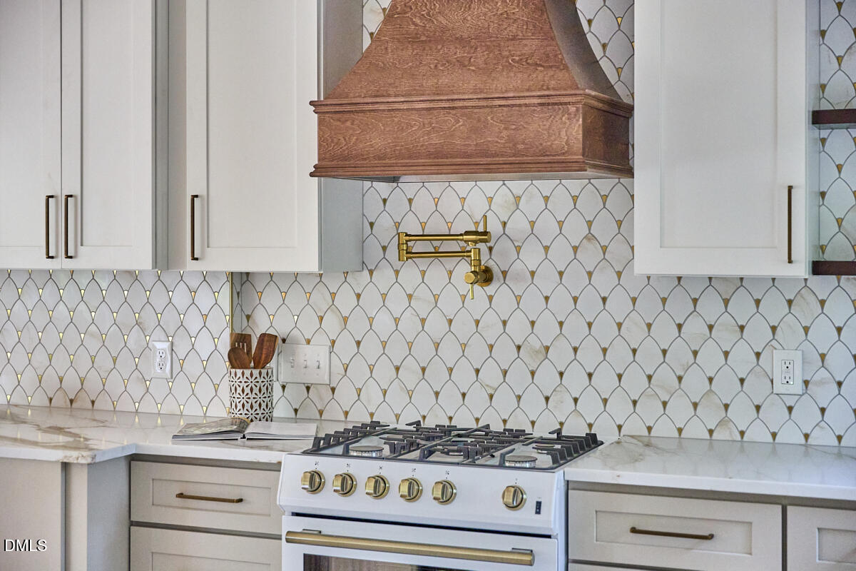 1609 Acadia Street Durham, NC 27701 - Photo 18 of 56 a stove top oven sitting inside of a kitchen