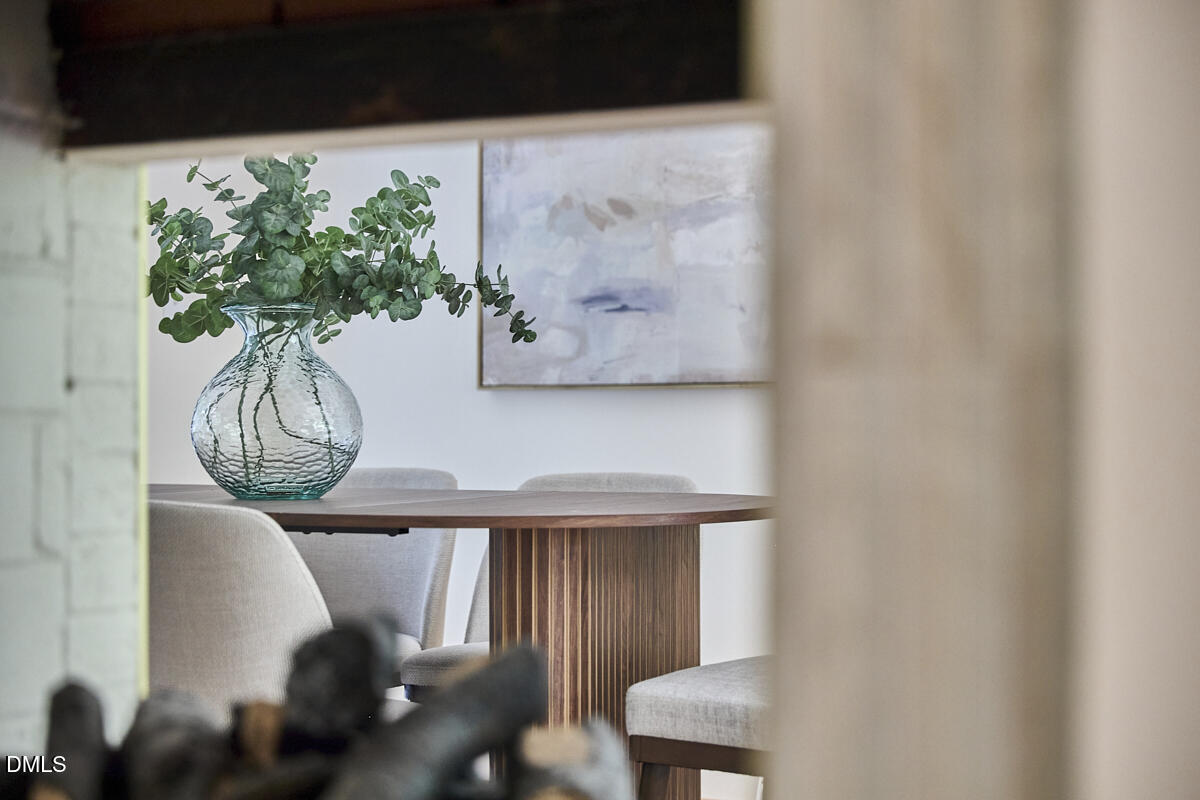 1609 Acadia Street Durham, NC 27701 - Photo 24 of 56 a vase of flowers sitting on a table